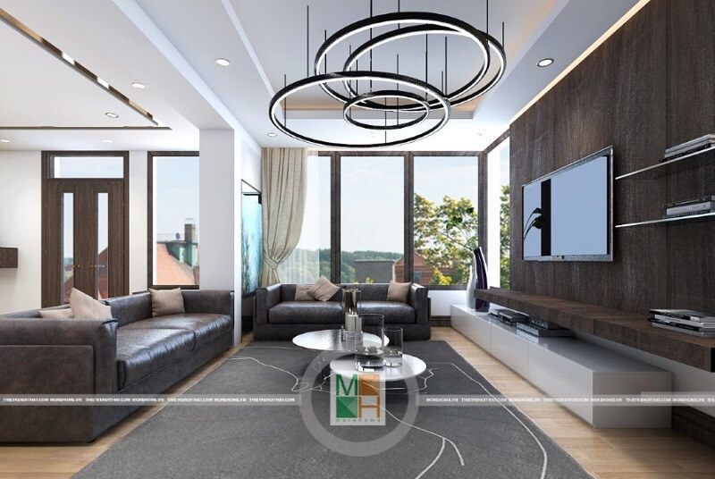 Bộ sofa bọc da màu đen hiện đại mang đến sự sang trọng cho phòng khách chung cư