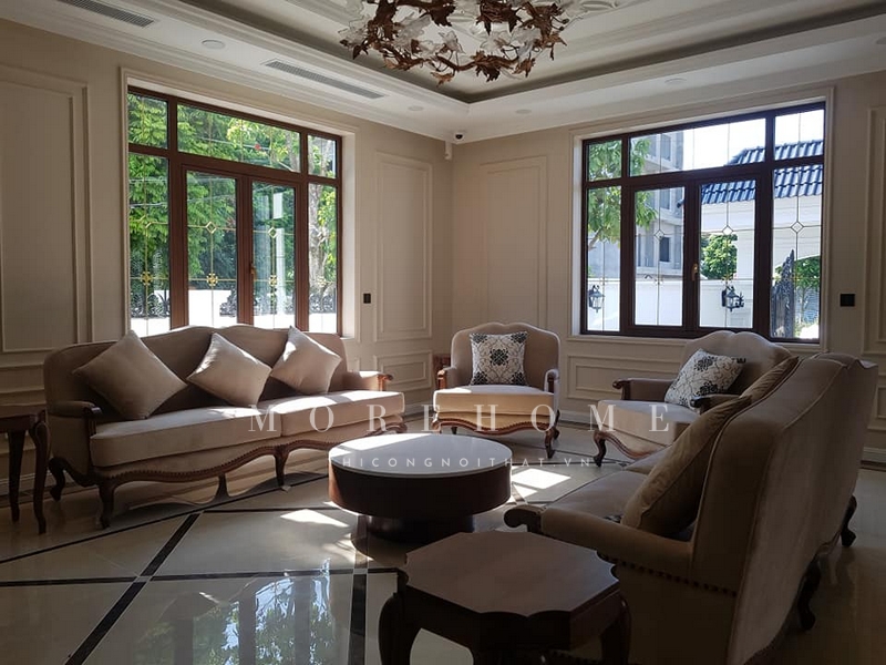 Thi công bàn trà tròn gỗ óc chó mặt đá ngoài việc làm bàn uống nước còn là món đồ nội thất trang trí cho không gian